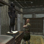 Studying His Employer's Armor Studying His Employer's Armor